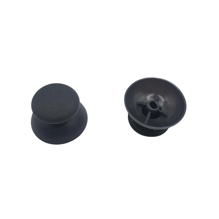 Caches de joystick (grand trou) pour manettes PlayStation 1 (lot de 2)