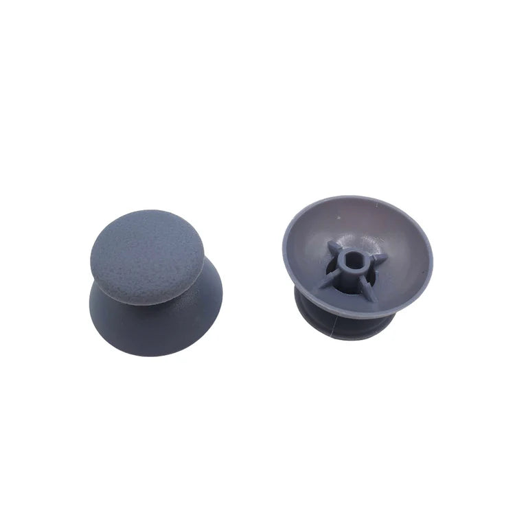 Caches de joystick (grand trou) pour manettes PlayStation 1 (lot de 2)